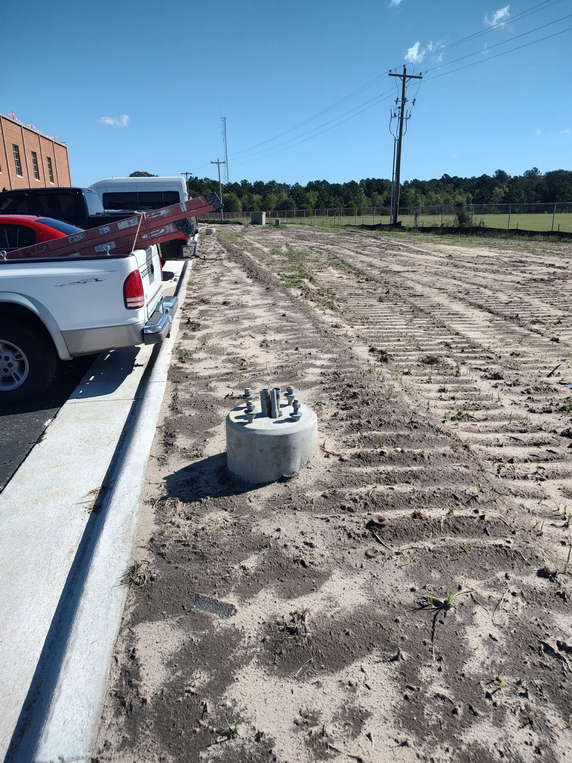 Electrical service base and site preparation